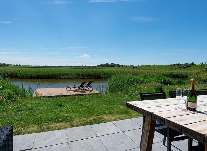 Gezellige woonkamer in Waterlijn 06 vakantiehuis, Kamperland, Noord-Beveland, Zeeland.