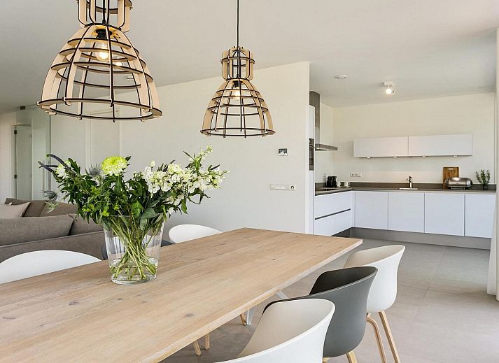 Cozy living room with fireplace in Waterline 10, vacation home in Kamperland, Zeeland.
