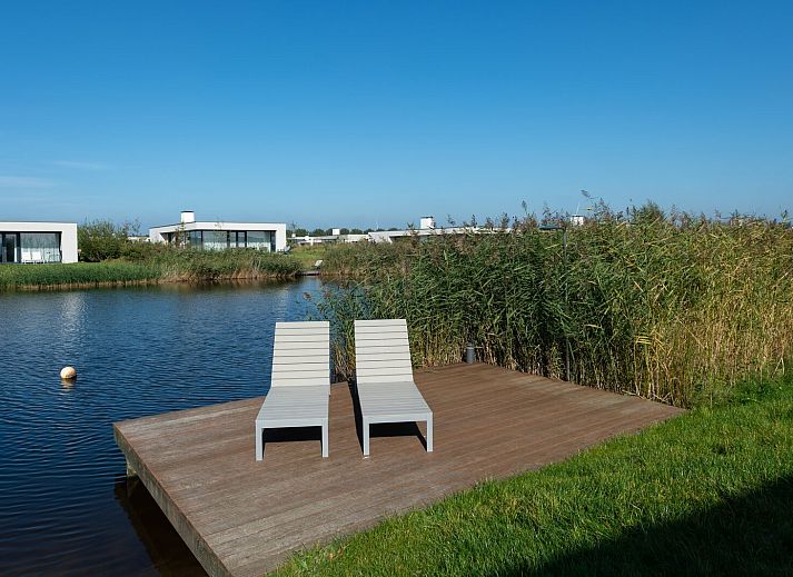 Geraeumiges Wohnzimmer mit Aussicht in Waterlijn 11 | De Groote Duynen, Ferienhaus in Kamperland, Zeeland.
