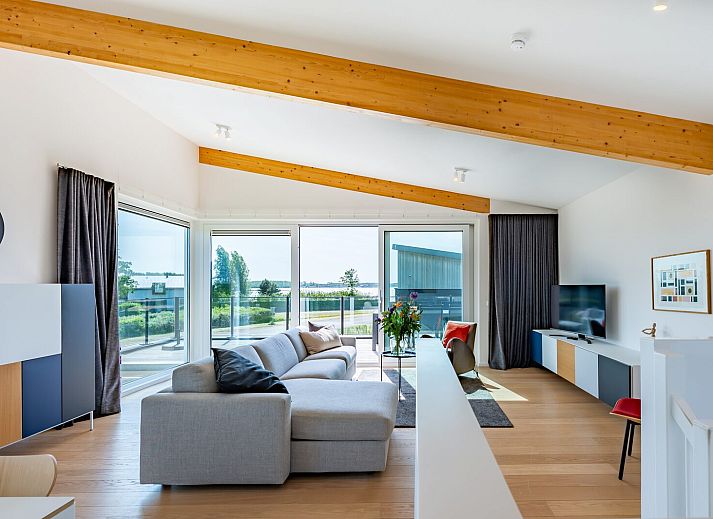 Gemuetliches Wohnzimmer im Schotsmanweg 16 | Zeeuws Goedt, Ferienhaus in Kamperland, Noord-Beveland mit Blick auf die Natur.