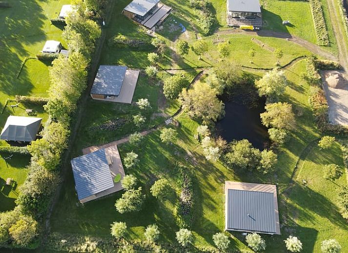 Vacation home in Kamperland located on a picturesque lake, ideal for rest and nature experience in North Beveland, Zeeland.
