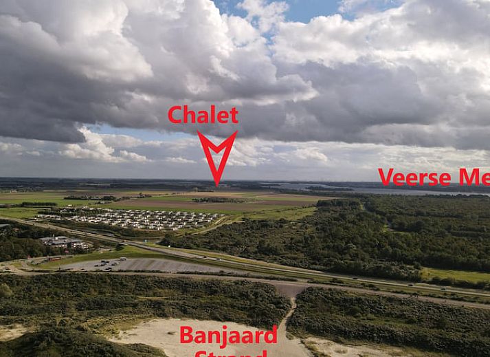 Stylish vacation home in Kamperland with glass facades and spacious outdoor space in North Beveland, Zeeland.