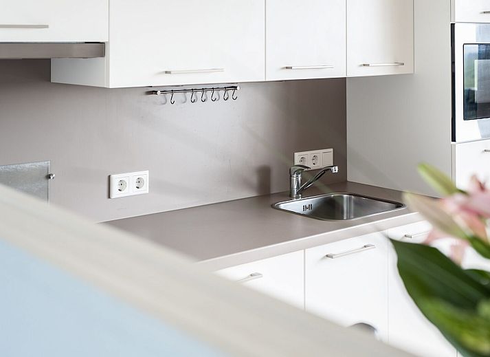 Cozy living room in Ostrea 34, Roompot Beach Resort, Kamperland, vacation home with comfortable seating area.