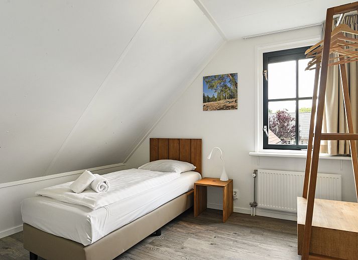 Gezellige woonkamer in Duinpark 't Hof van Haamstede 8-persoons bungalow 8E1, Burgh-Haamstede.