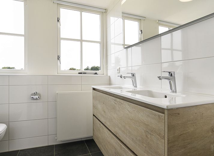 Comfortabele zithoek in vakantiehuis Duinpark 't Hof van Haamstede, Burgh-Haamstede, Zeeland.