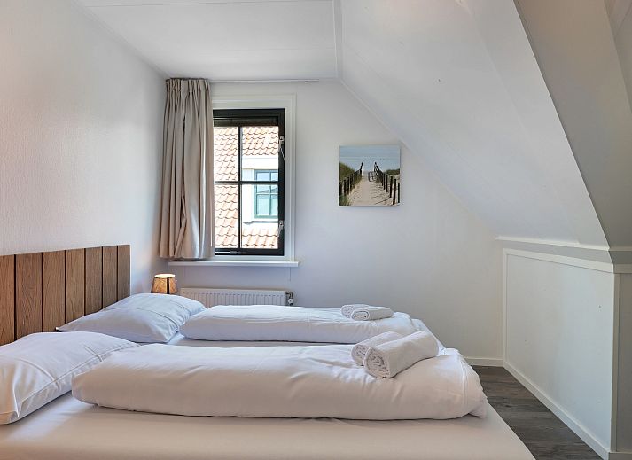 Cozy living room with lots of light in Duinpark 't Hof van Haamstede 10-person vacation home in Schouwen-Duiveland, Zeeland.