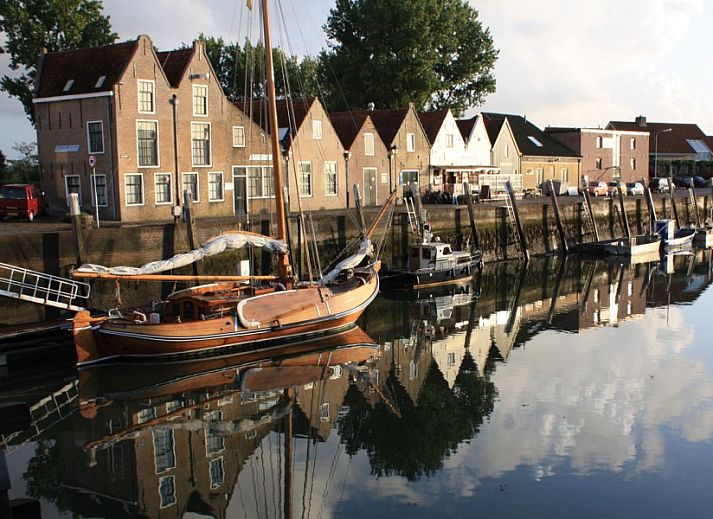 Knusse tweepersoonskamer in De Fazant vakantiehuis, Burgh-Haamstede, ideaal voor gezinnen in Zeeland.