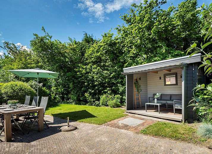 Vakantiewoning Zeepe Duinen 17, De Kreeft in Burgh-Haamstede, woonkamer met gezellige sfeer en moderne inrichting.