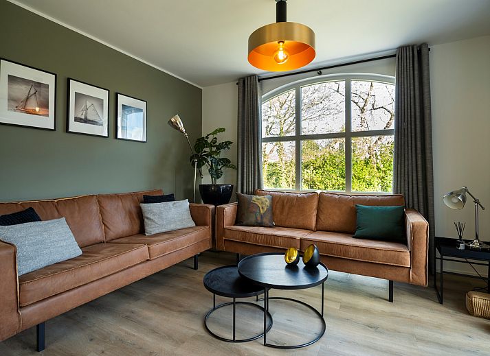 Charming vacation home Holiday home Schouwse Duin 27 "l'Ancora" in Burgh-Haamstede with classic brick facade.