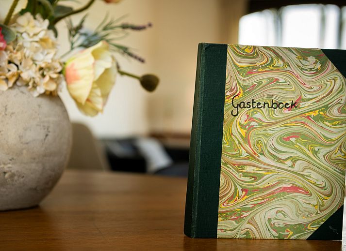 Detail of tableware on the terrace of Holiday home Schouwse Duin 35 in Burgh-Haamstede, ideal for outdoor dining.