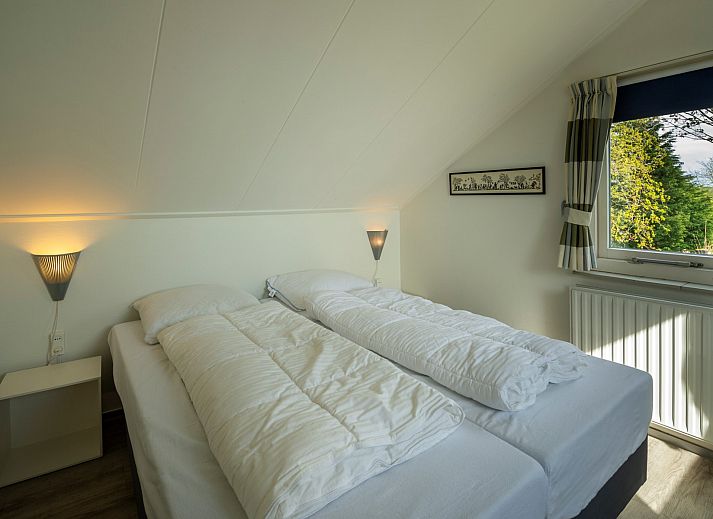 Detail of tableware on the terrace of Holiday home Schouwse Duin 35 in Burgh-Haamstede, ideal for outdoor dining.