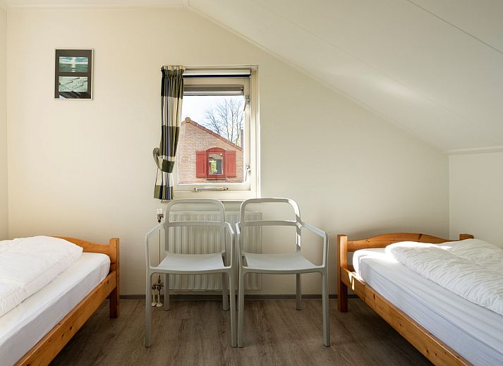 Detail of tableware on the terrace of Holiday home Schouwse Duin 35 in Burgh-Haamstede, ideal for outdoor dining.