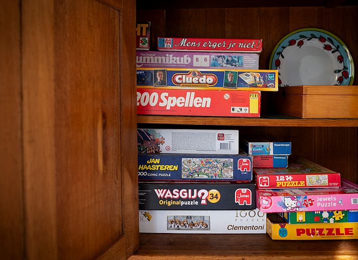 Cozy sitting area in Holiday home Schouwse Duin 35, Burgh-Haamstede, overlooking the garden in Zeeland.