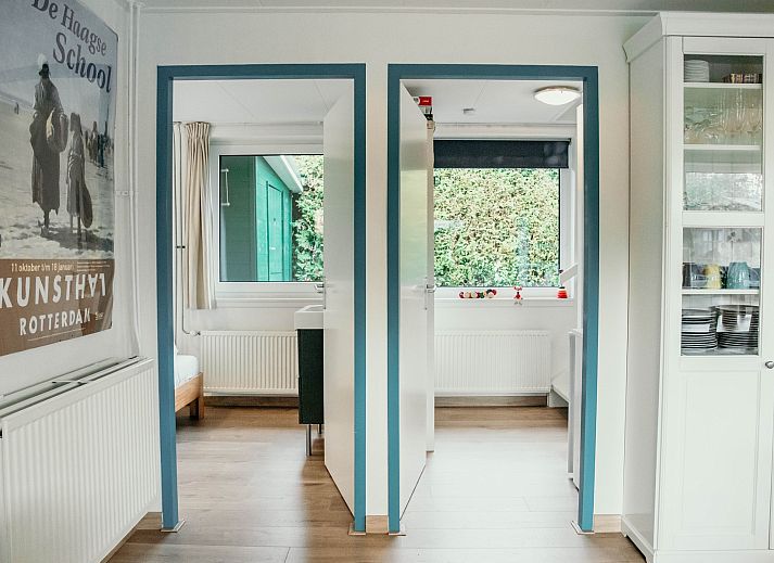 Gemuetliches Wohnzimmer des Familienhauses Duinrand, ideal zum Entspannen in Burgh-Haamstede.