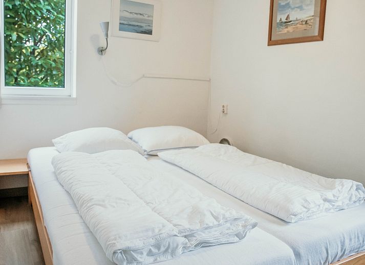 Gemuetliches Wohnzimmer des Familienhauses Duinrand, ideal zum Entspannen in Burgh-Haamstede.