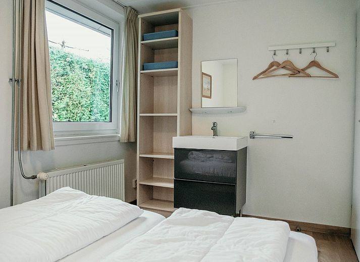 Gemuetliches Wohnzimmer des Familienhauses Duinrand, ideal zum Entspannen in Burgh-Haamstede.