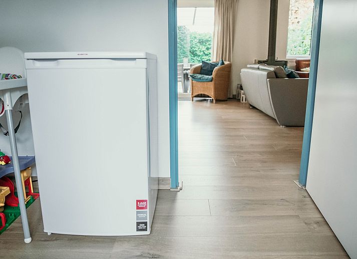 Gemuetliches Wohnzimmer des Familienhauses Duinrand, ideal zum Entspannen in Burgh-Haamstede.