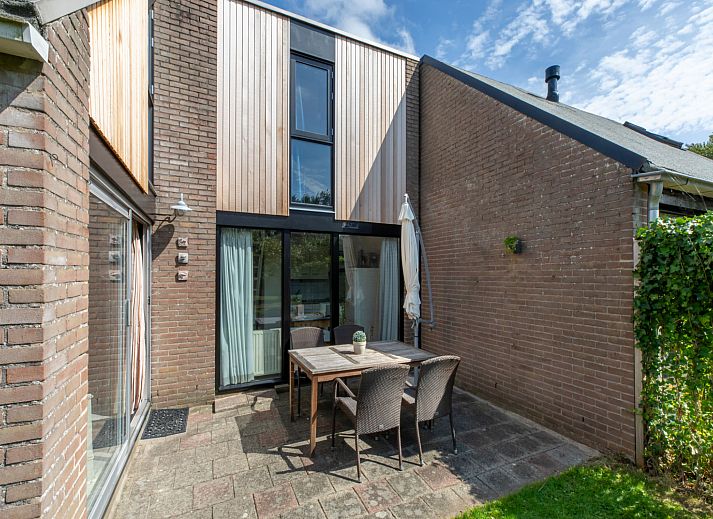 Gezellige woonkamer van Vakantiehuis Buitenplaats Schouwen nr 86 in Burgh-Haamstede, Zeeland.