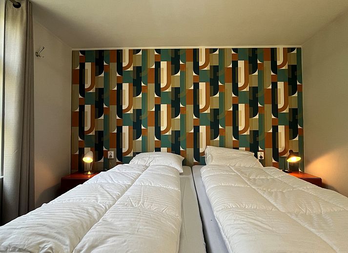 Geniet van het zonnige terras bij Vakantiewoning Het Ongerepte 21 'Kaatje Mossel' in Renesse, Schouwen-Duiveland, een charmant vakantiehuis in Zeeland.