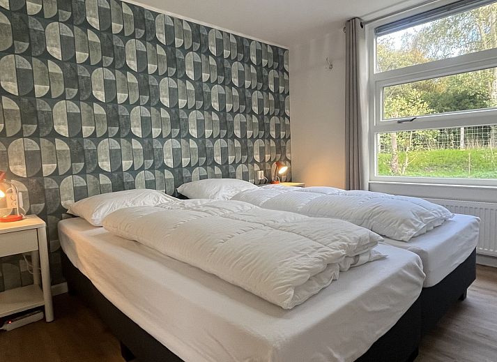 Geniet van het zonnige terras bij Vakantiewoning Het Ongerepte 21 'Kaatje Mossel' in Renesse, Schouwen-Duiveland, een charmant vakantiehuis in Zeeland.