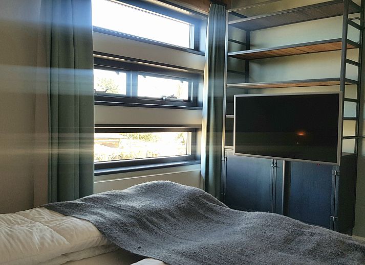 Large garden at Holiday home Horizon 36, 'Sea You' in Renesse, ideal for relaxation.