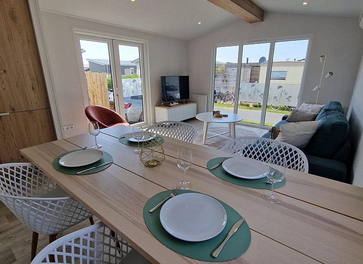 Enjoy the terrace of VZ2326 Holiday Chalet Stern 1866 Renesse, ideal for outdoor dining in Schouwen-Duiveland, Zeeland.