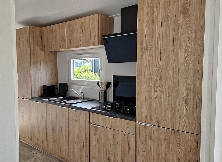 Enjoy the terrace of VZ2326 Holiday Chalet Stern 1866 Renesse, ideal for outdoor dining in Schouwen-Duiveland, Zeeland.