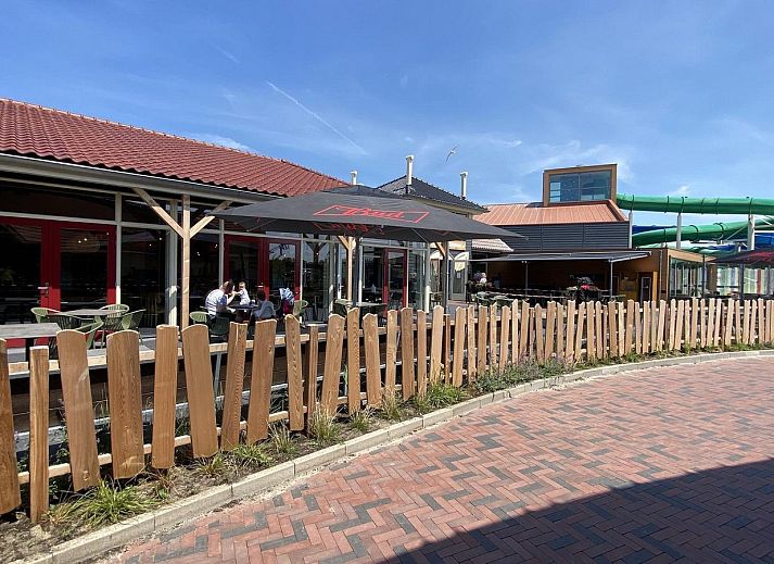 Spacious terrace with comfortable seating at VZ2326 Holiday Chalet Stern 1866 Renesse in Renesse, Schouwen-Duiveland.