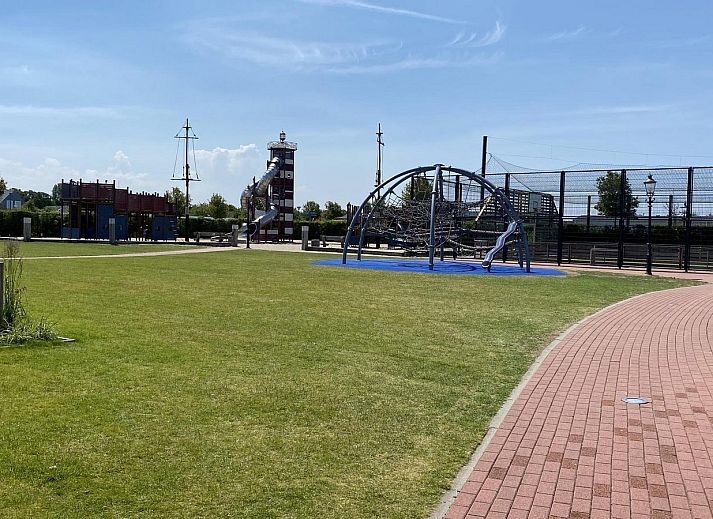 Cozy living room of VZ2326 Holiday Chalet Stern 1866 Renesse with modern decor in Zeeland.