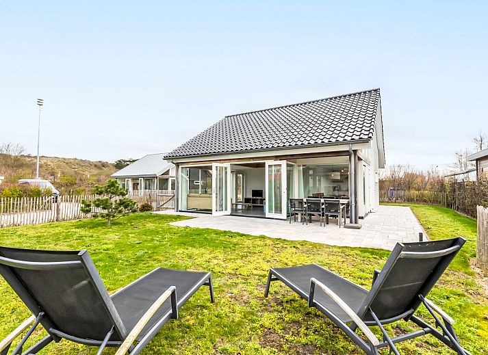 Aerial view of Holiday home Duinzicht Renesse overlooking the coastline of Schouwen-Duiveland, Zeeland.