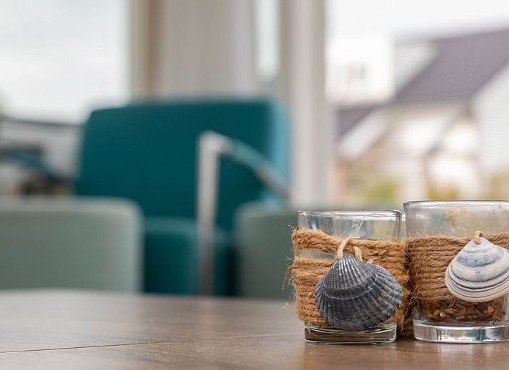 Spacious living room in Holiday home Duinzicht Renesse with modern furnishings and lots of natural light.