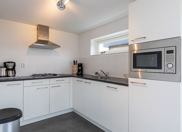 Comfortable bedroom in Holiday home Duinzicht Renesse with en-suite bathroom in Renesse, Zeeland.