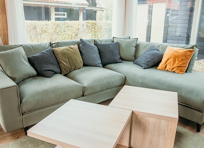 Vacation home Zonnedorp 14 Mon Repos in Renesse with modern wooden facade and terrace in Zeeland