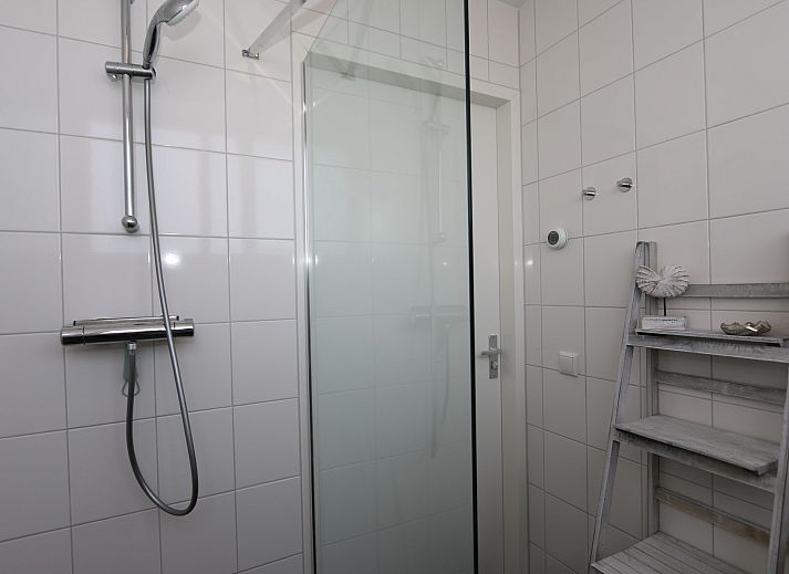 Gemuetliche Sitzecke im Ferienhaus Zonnedorp 18, Duinhuis 18 in Renesse, Zeeland mit Blick auf den Garten.