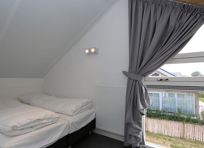 Gemuetliche Sitzecke im Ferienhaus Zonnedorp 19, Renesse, ideal zum Entspannen in Zeeland.