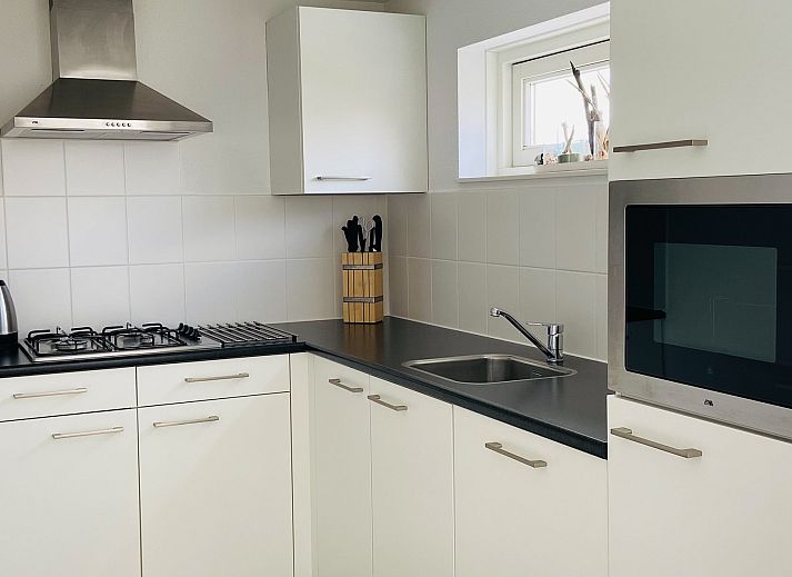 Aussenansicht des Ferienhauses Zonnedorp 29 Strandloper mit Terrasse und Garten in Renesse, Zeeland.