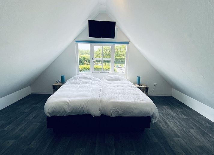 Vorderseite von VZ704 Freistehendes Ferienhaus Renesse mit grosser Veranda, Renesse, Schouwen-Duiveland, Zeeland.