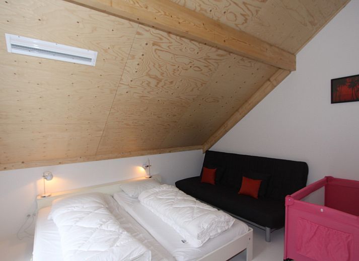 Cozy outdoor area of Family House Bremweg 22 in Renesse, ideal for relaxing in nature.