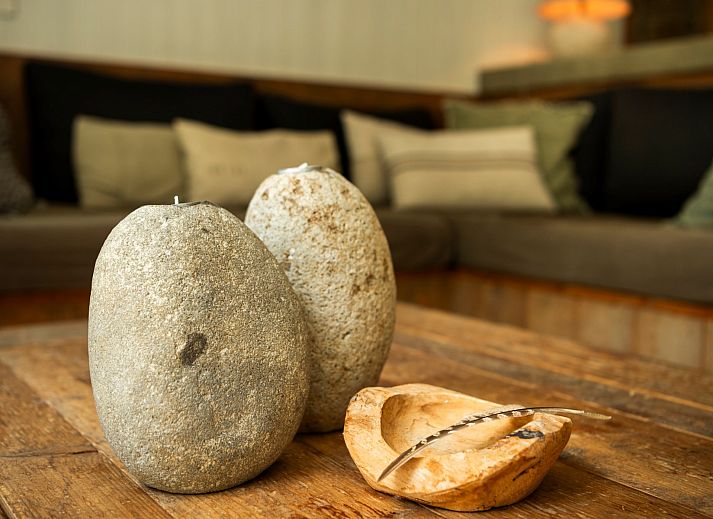 Ueberdachter Sitzbereich des Ferienhauses Poplar Avenue 21, Lodge to Lounge, mit Blick auf den Garten.