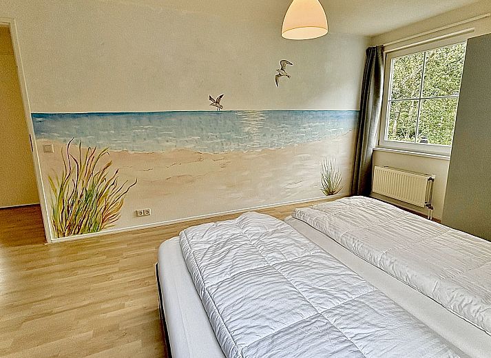 Detail der gemuetlichen Sitzecke auf der Veranda des Familienhauses Populierenlaan 5 in Nieuw-Haamstede.