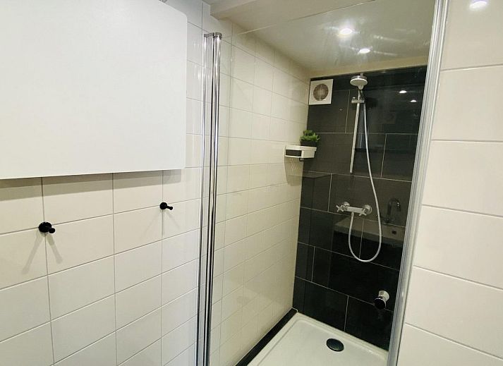 Cozy living room of VZ786 Holiday home Brouwershaven in Schouwen-Duiveland, ideal for relaxation in Zeeland.