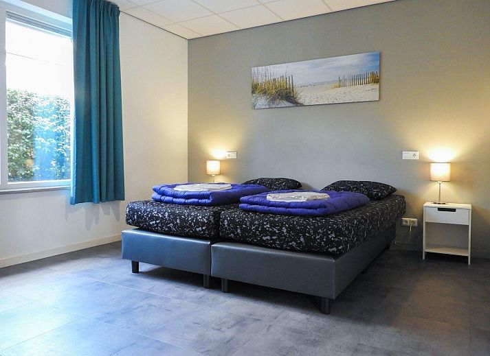 VZ272 Groepsaccommodatie Ellemeet, vakantiehuis in Zeeland, met terras en uitzicht op het omliggende landschap.