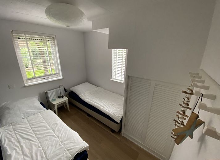 Enjoy the serene waterfront terrace at vacation home Zeelandmuschel in Den Osse, Schouwen-Duiveland, Zeeland.