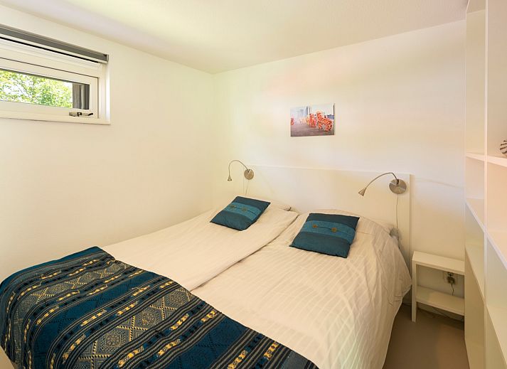 Vacation home Westerduyn 7 Erica in Zeeland with trampoline and green surroundings.