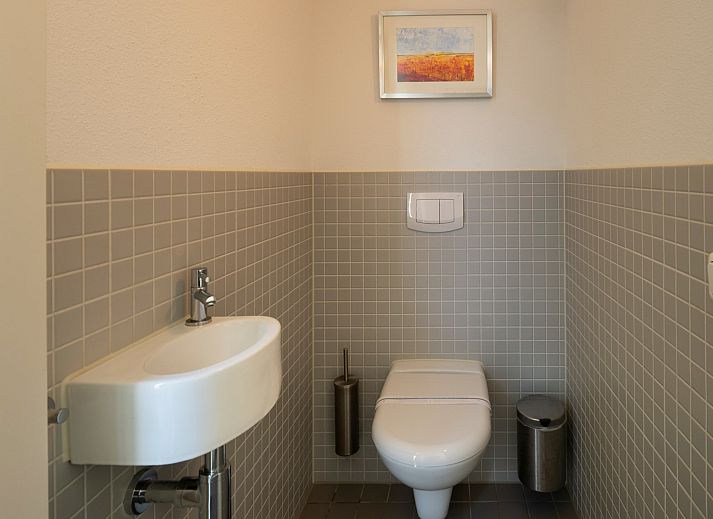 Bright living room of Holiday home Westerduyn 7 Erica in Westenschouwen, Zeeland.