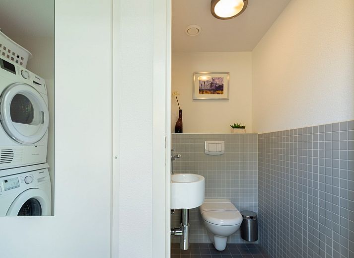 Bright living room of Holiday home Westerduyn 7 Erica in Westenschouwen, Zeeland.