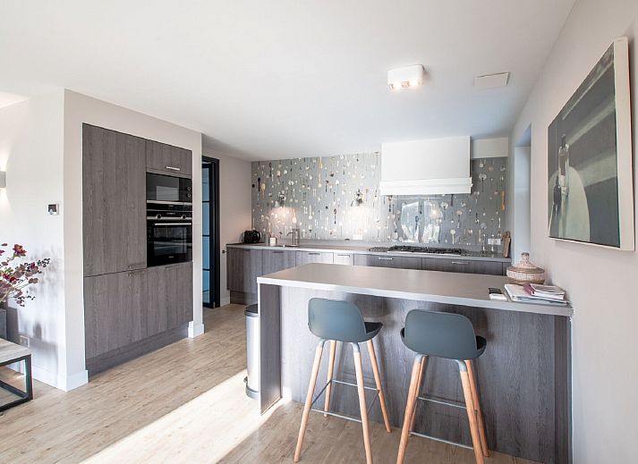 Stylish living room in Holiday home Oesterdam Resort, Tholen, Zeeland with comfortable seating area.