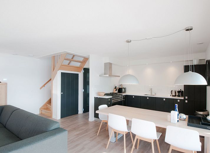 Beach at sunset at Holiday home Oesterdam Resort in Tholen, Zeeland.