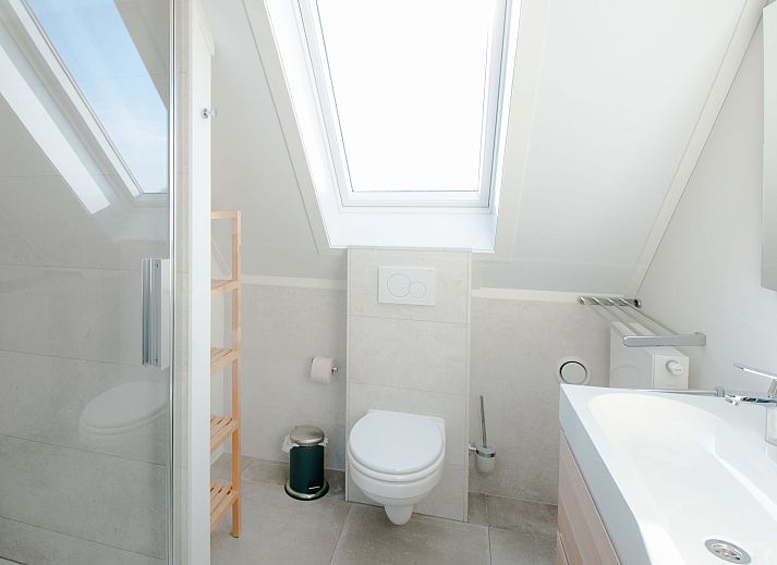 Beach at sunset at Holiday home Oesterdam Resort in Tholen, Zeeland.