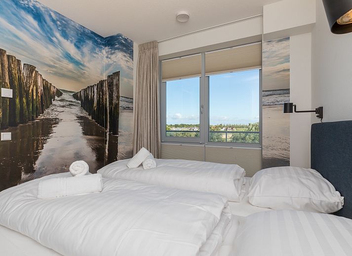 Geniet van het prachtige zeezicht vanaf het ruime terras van Appartement in Scherpenisse, gelegen in het schilderachtige Tholen, Zeeland.